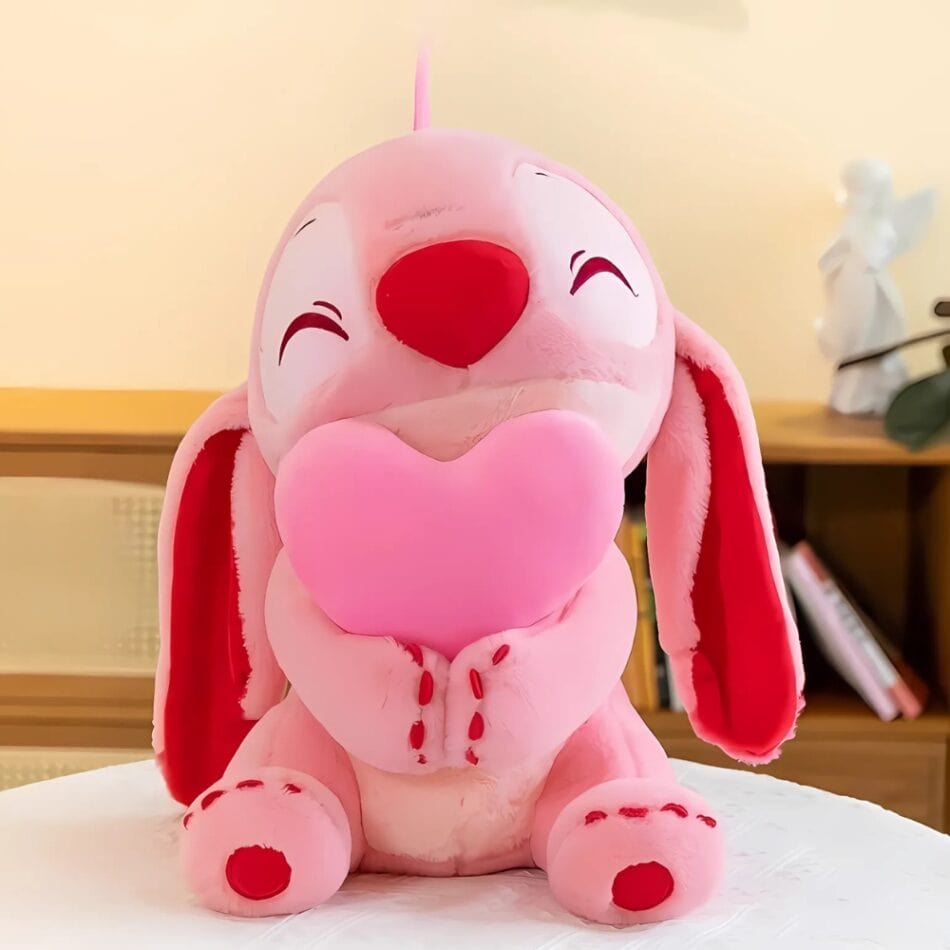 La Peluche Angel Peluche Stitch avec cœur