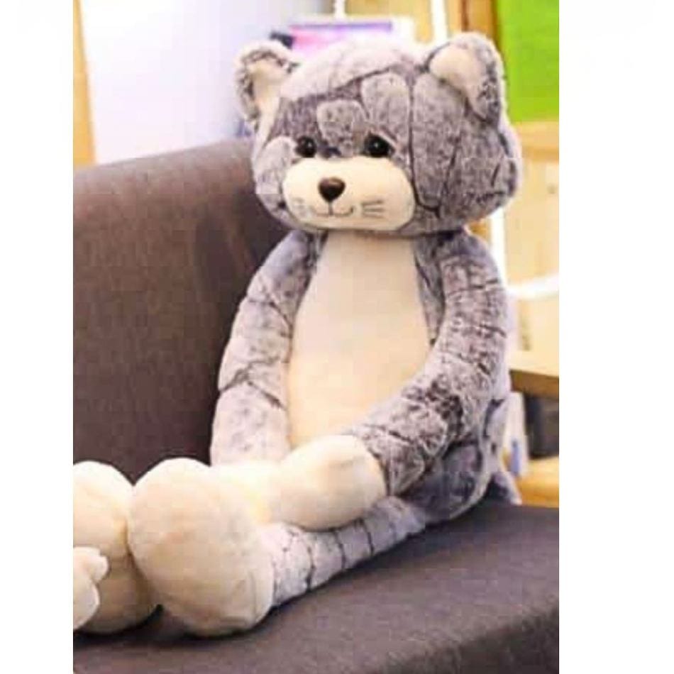 La Peluche Peluche chat gris aux longues jambes