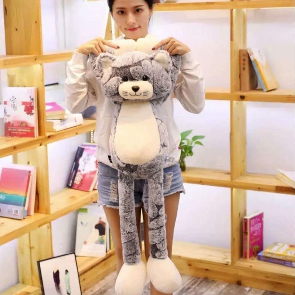 La Peluche Peluche chat gris aux longues jambes