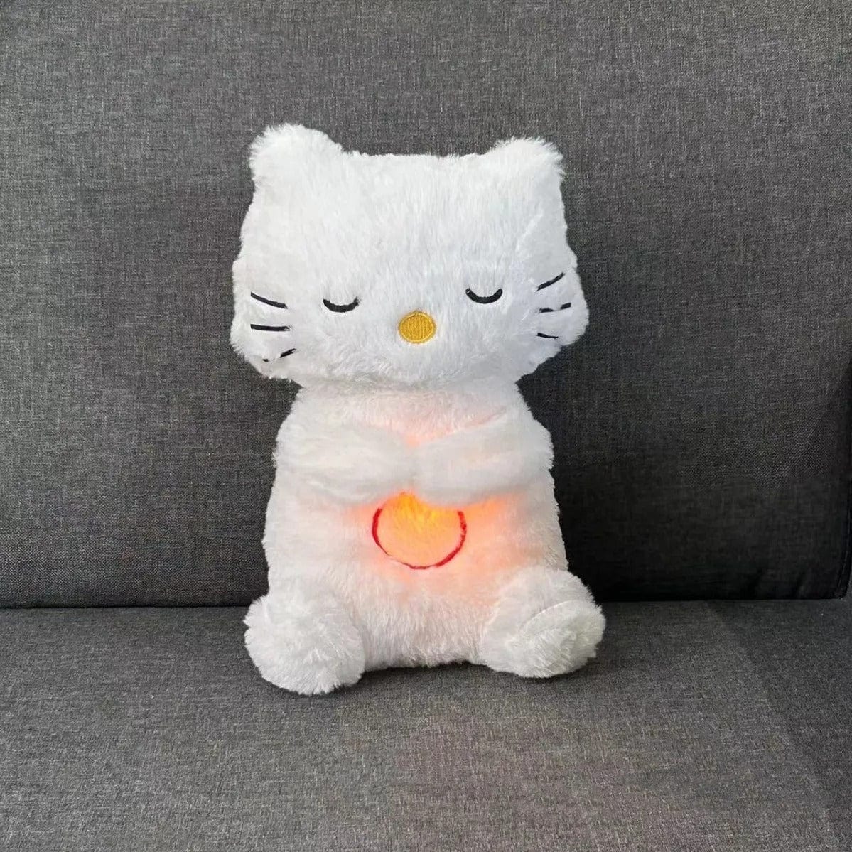 La Peluche Peluche chat respirant avec berceuse