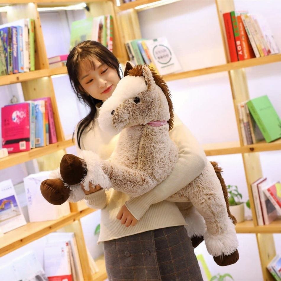 La Peluche Peluche cheval beige couché