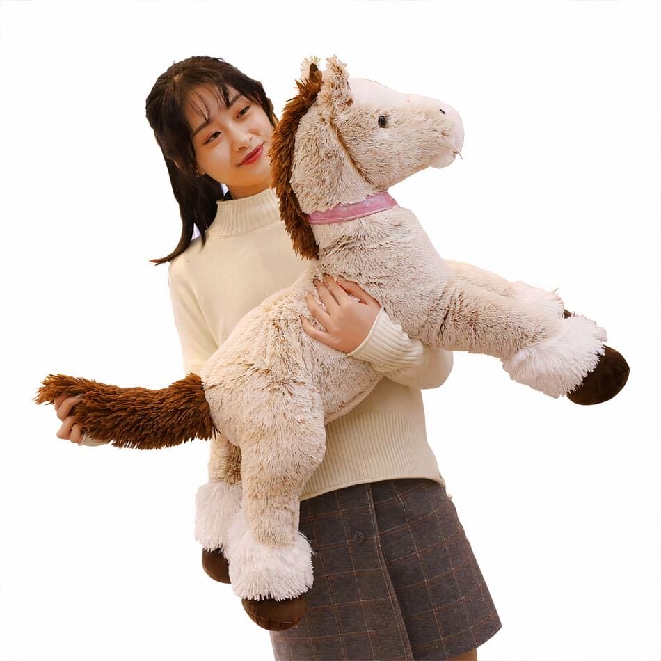 La Peluche Peluche cheval beige couché