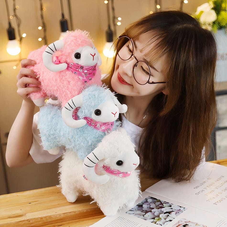 La Peluche Peluche chèvre pour petite fille