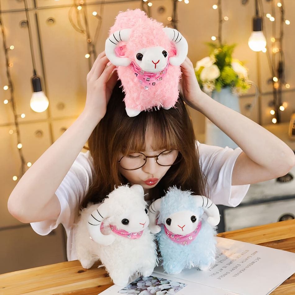 La Peluche Peluche chèvre pour petite fille