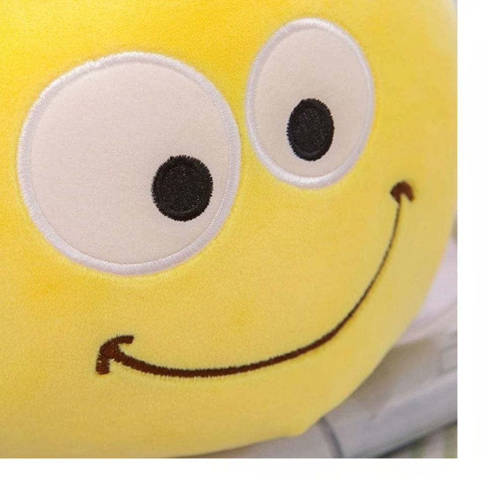 La Peluche Peluche coussin abeille souriante