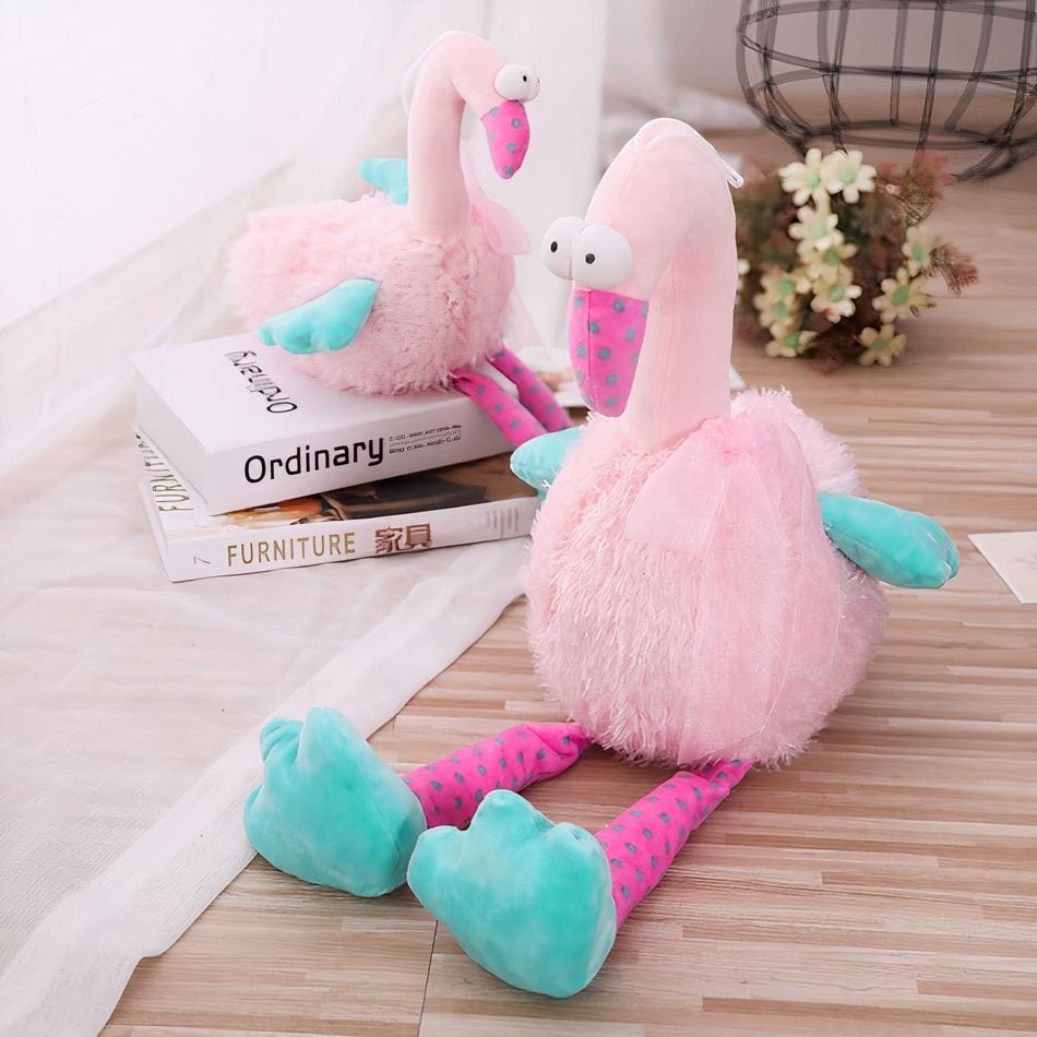 La Peluche Peluche flamant rose rigolo
