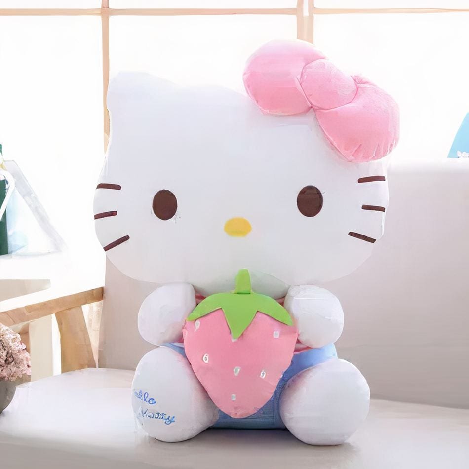 La Peluche Peluche Hello Kitty avec une fraise