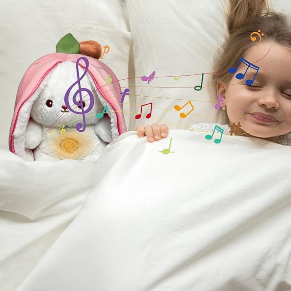 La Peluche Peluche lapin fraise respirante et berceuses