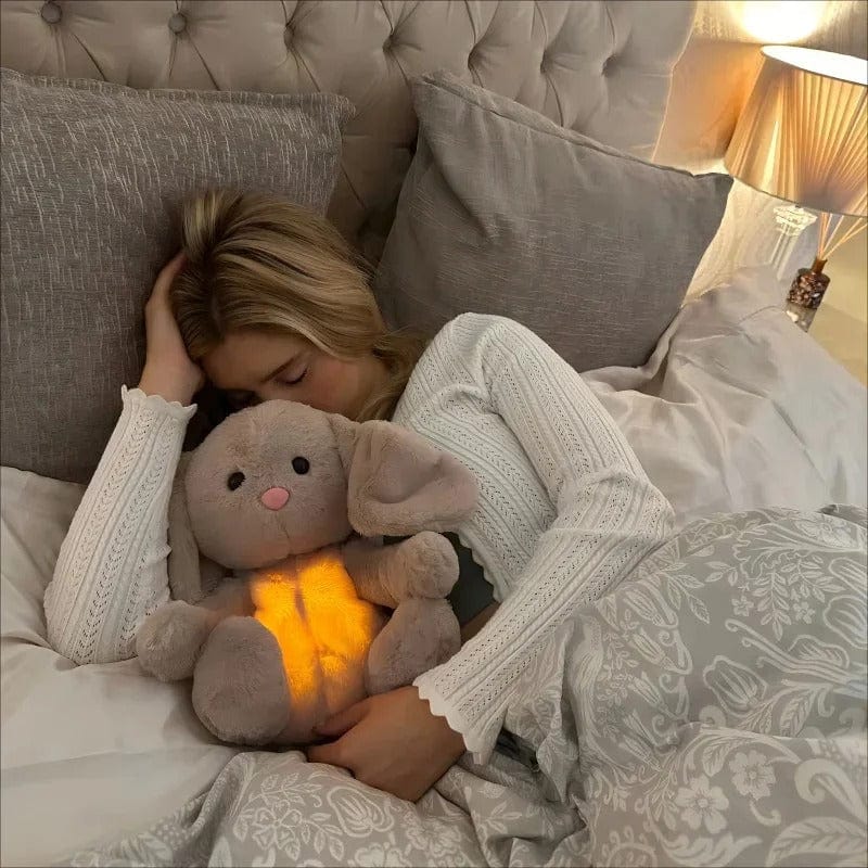 La Peluche Peluche lapin respirante avec berceuse relaxante