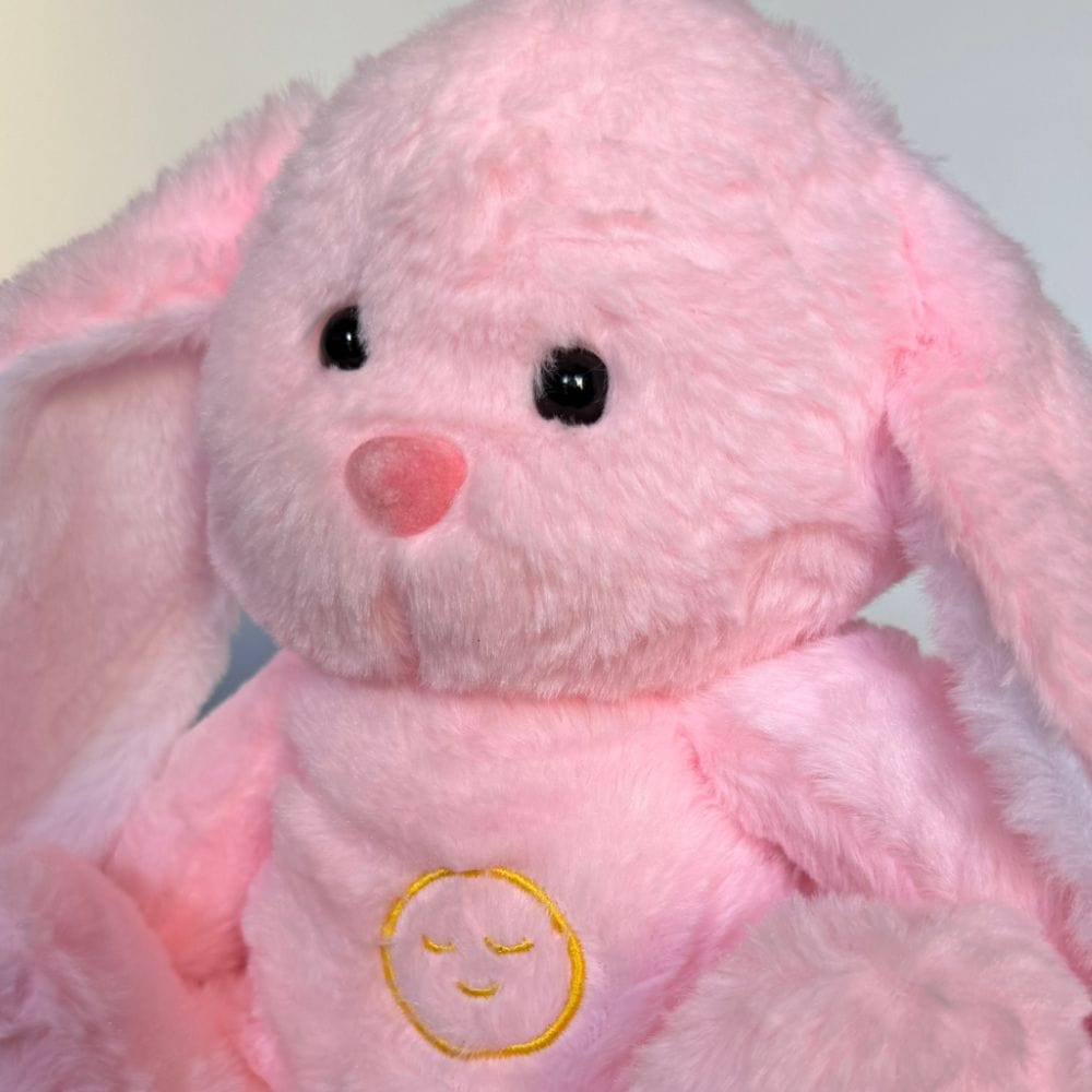 La Peluche Peluche lapin veilleuse rose respirante
