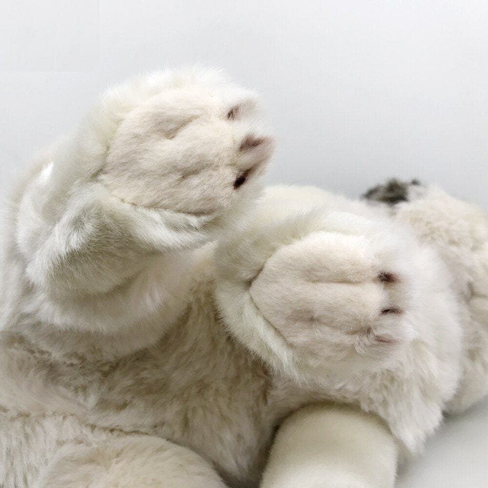 La Peluche Peluche loup accroupie