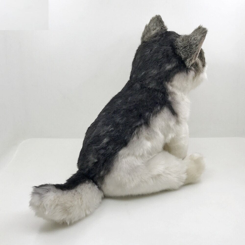 La Peluche Peluche loup accroupie