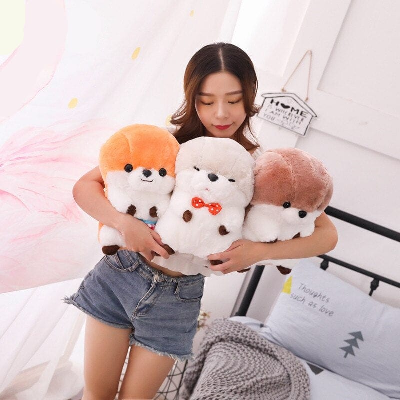 La Peluche Peluche loutre avec tablier