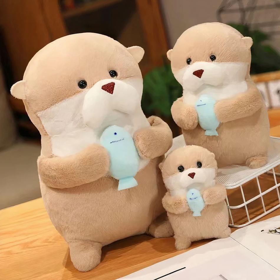 La Peluche Peluche loutre et son poisson