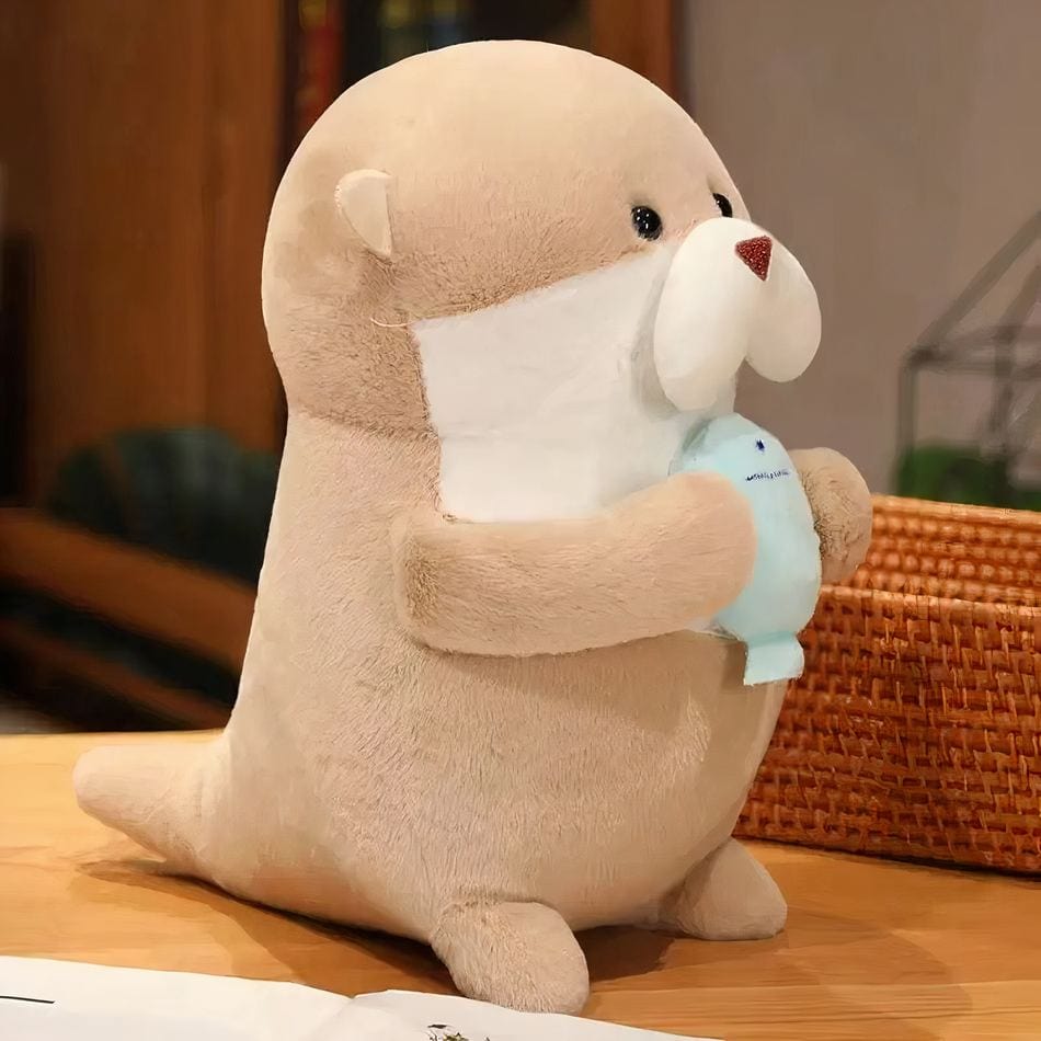 La Peluche Peluche loutre et son poisson