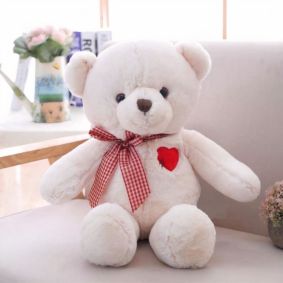 La Peluche Peluche ours blanc avec cœur