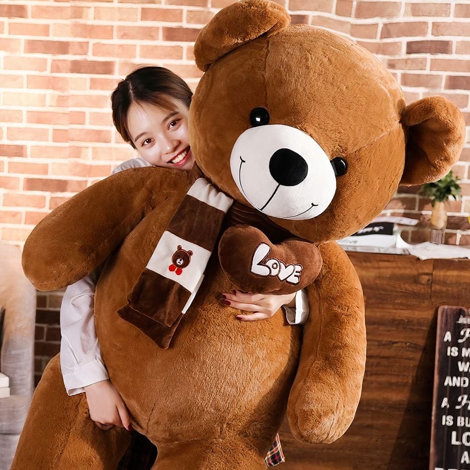 La Peluche Peluche ours marron avec écharpe