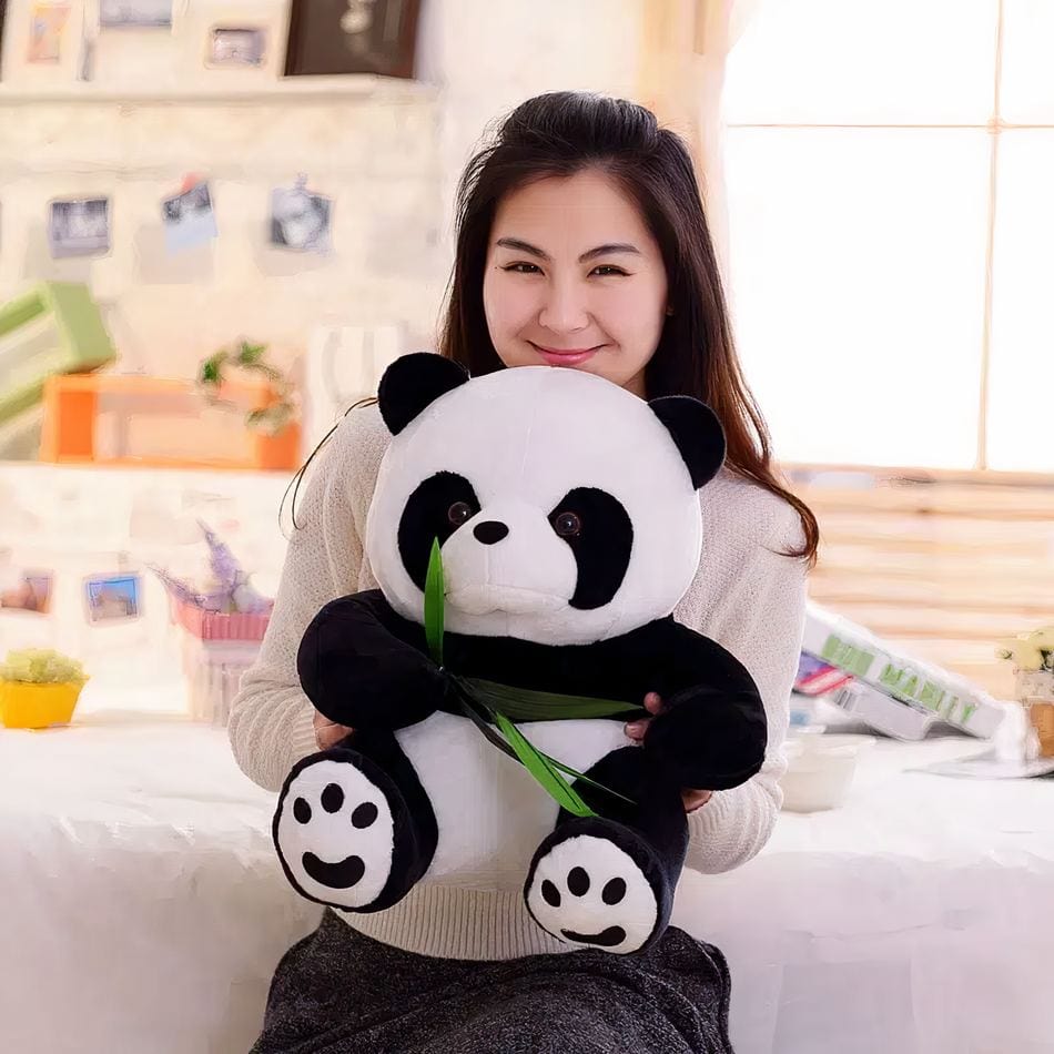 La Peluche Peluche panda avec feuilles