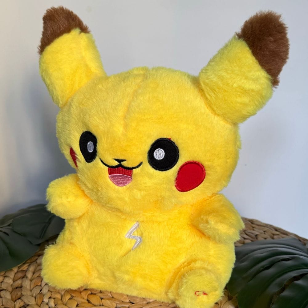 La Peluche Peluche Pikachu respirante avec berceuses