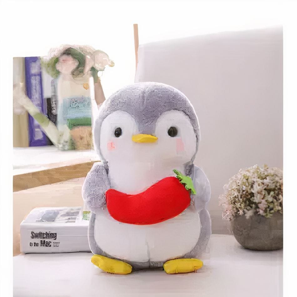 La Peluche Peluche pingouin avec un piment