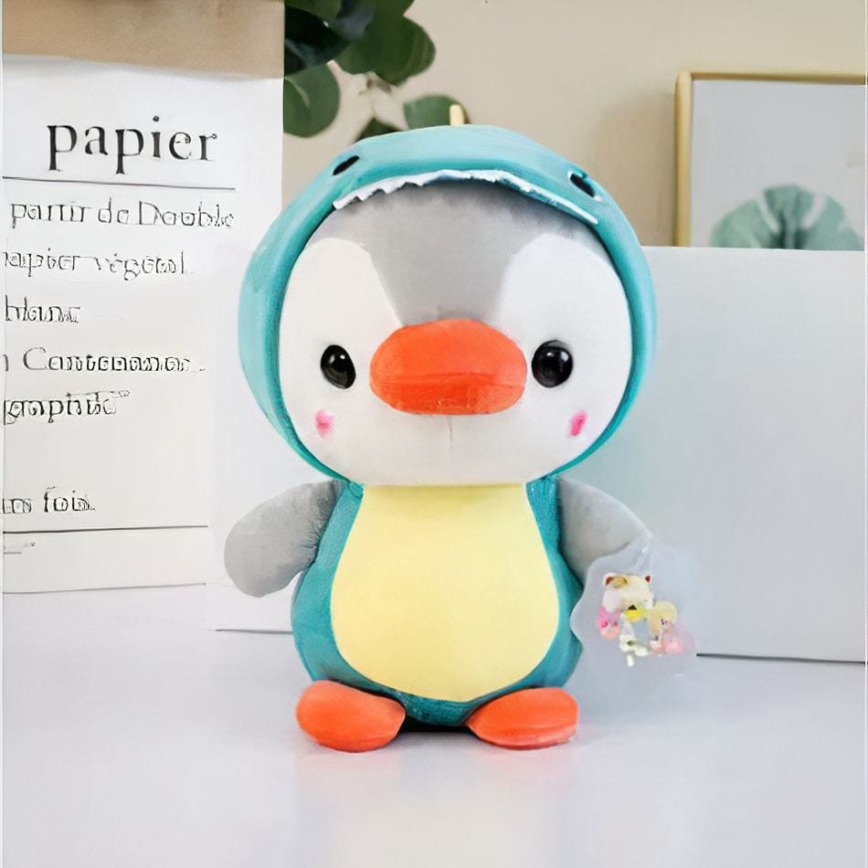 La Peluche Peluche pingouin en dinosaure