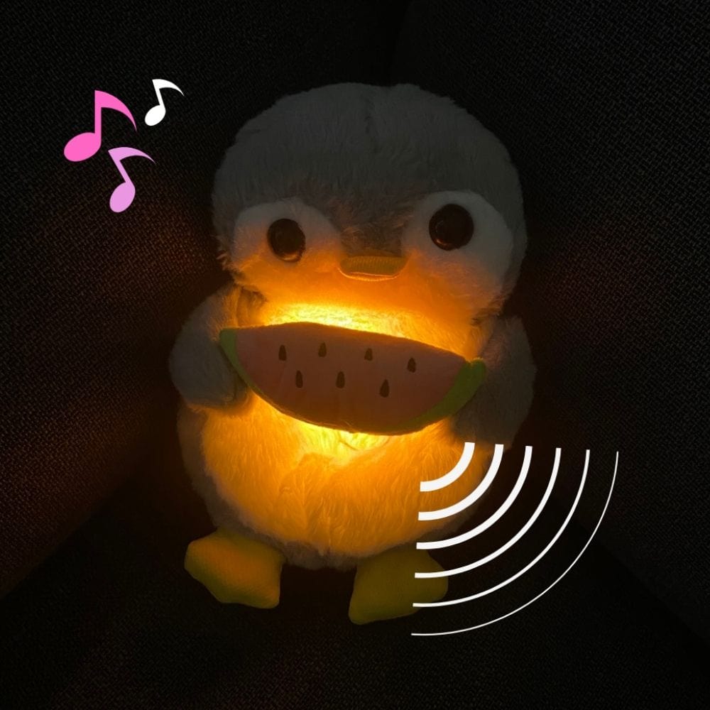La Peluche Peluche pingouin respirante avec berceuses