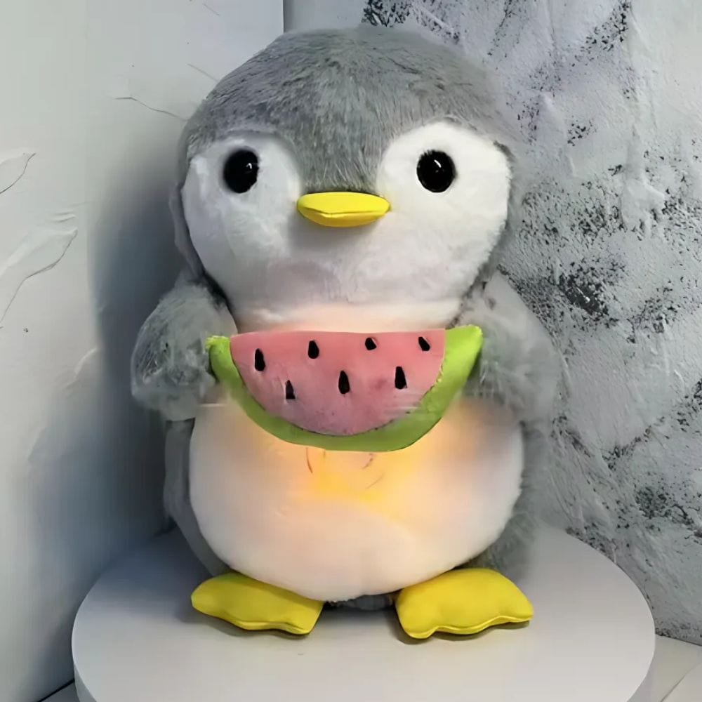 La Peluche Peluche pingouin respirante avec berceuses