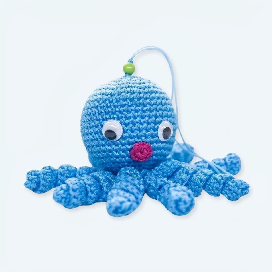 La Peluche Peluche poulpe bleue tricot