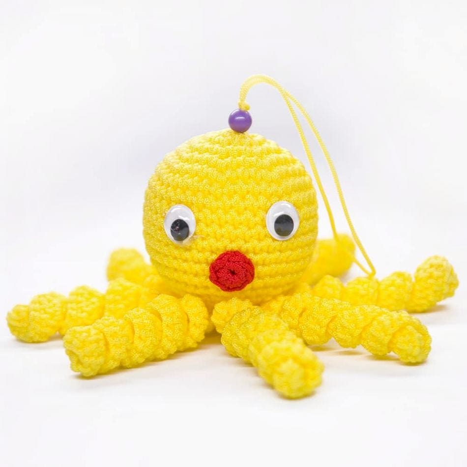 La Peluche Peluche poulpe jaune tricot