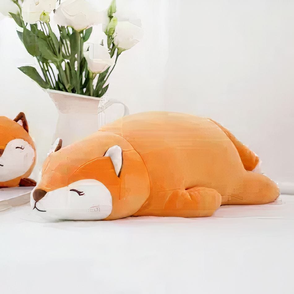 La Peluche Peluche renard allongé