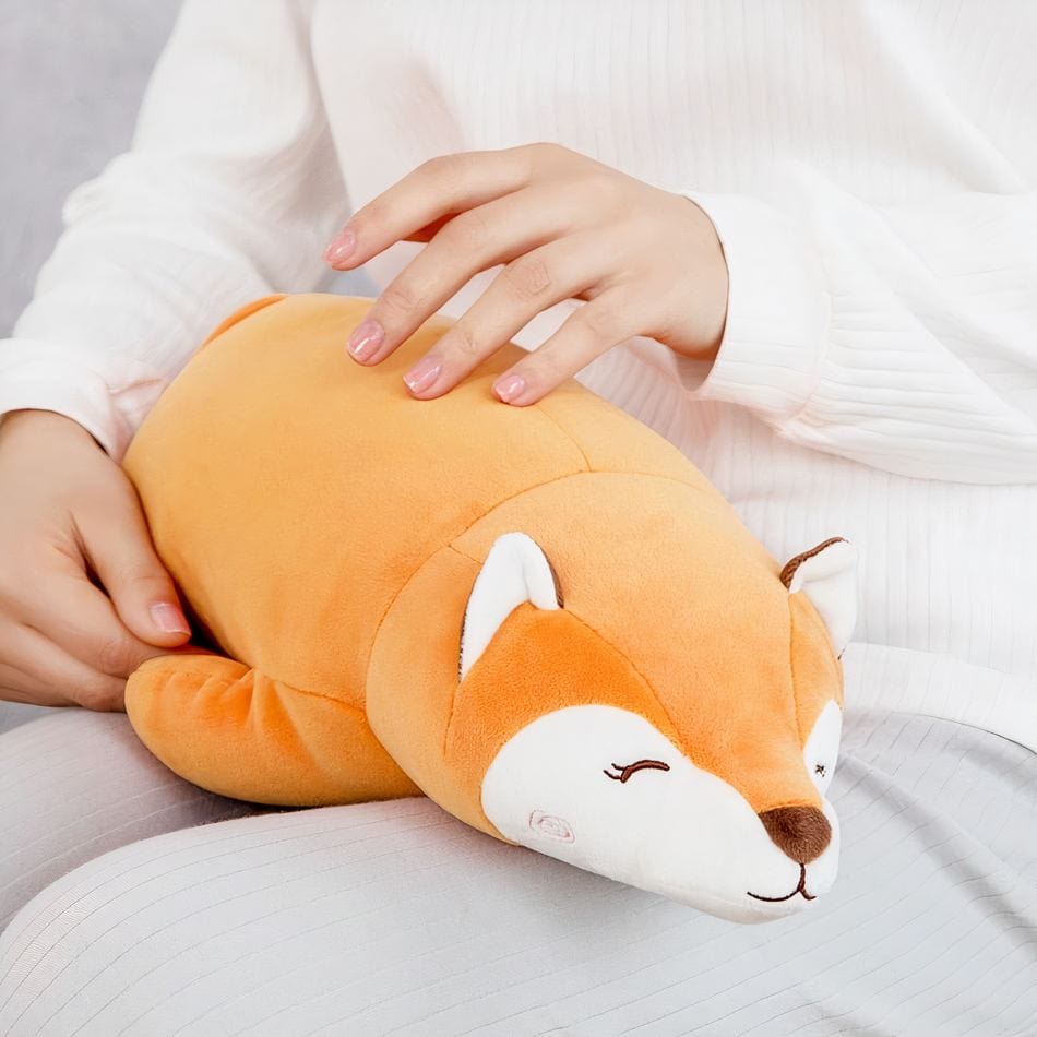 La Peluche Peluche renard allongé