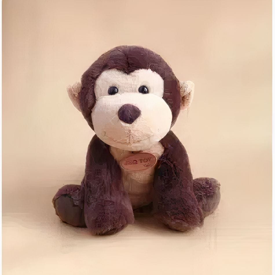 La Peluche Peluche singe doux