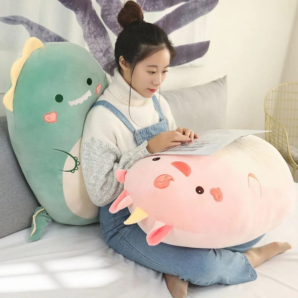 La Peluche Peluche Squishmallow dinosaure