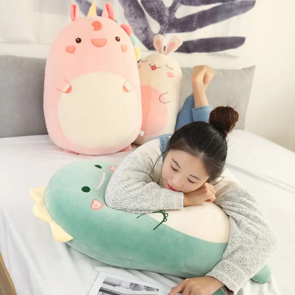La Peluche Peluche Squishmallow dinosaure