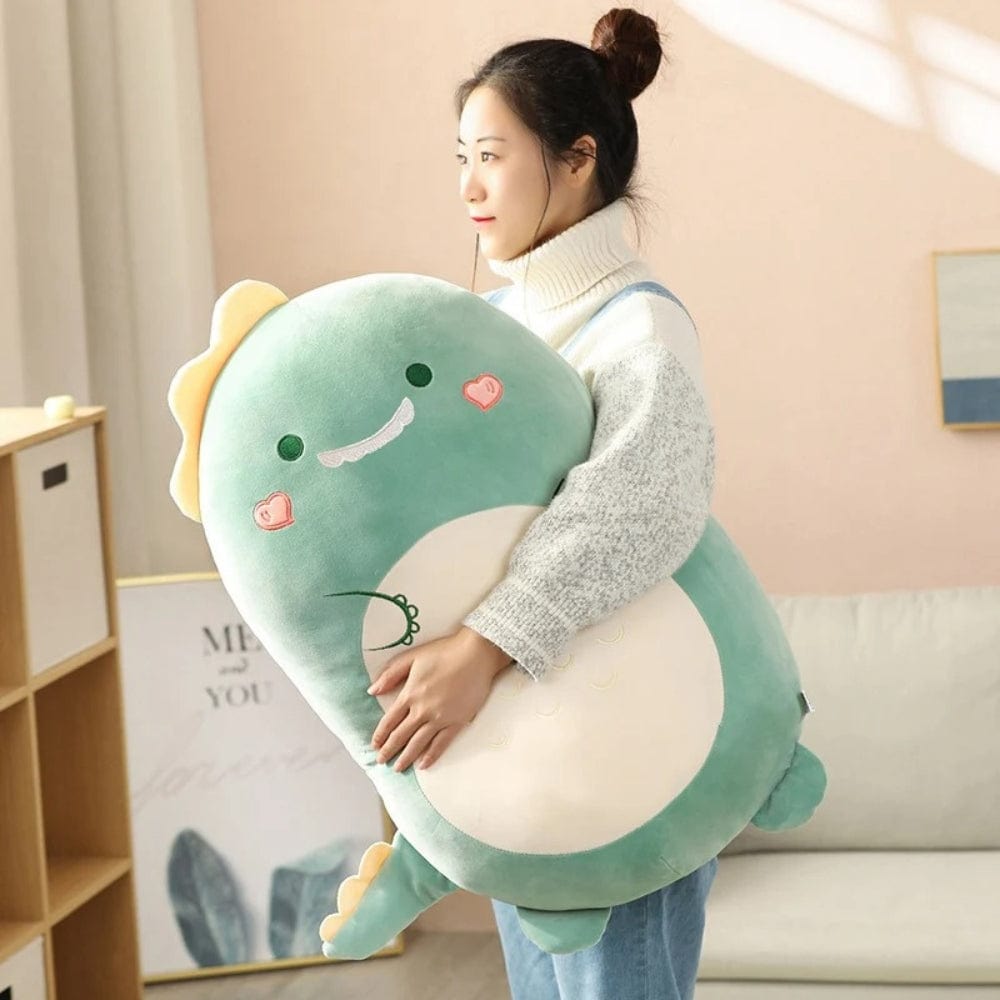 La Peluche Peluche Squishmallow dinosaure