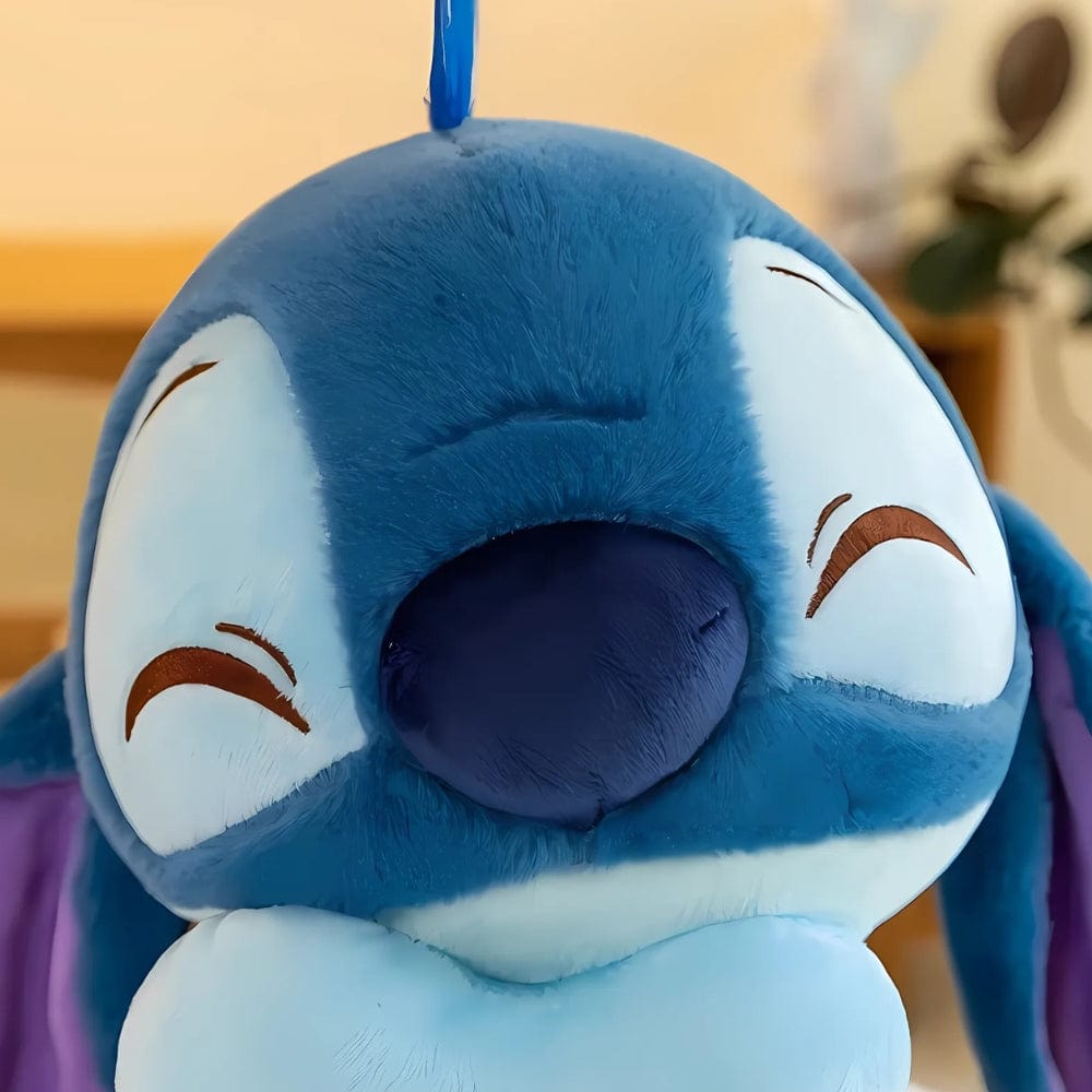 La Peluche Peluche Stitch avec cœur