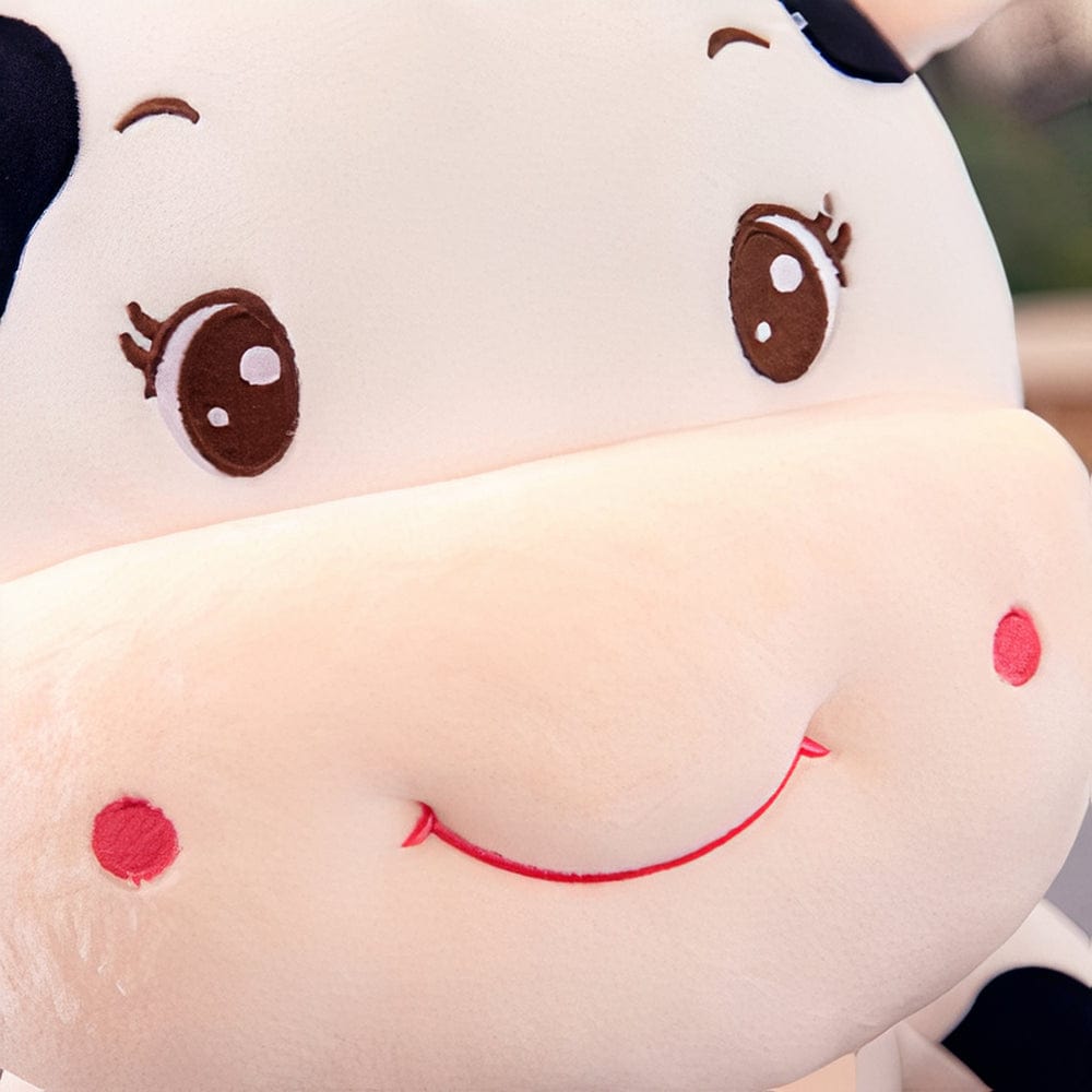 La Peluche Peluche vache bébé
