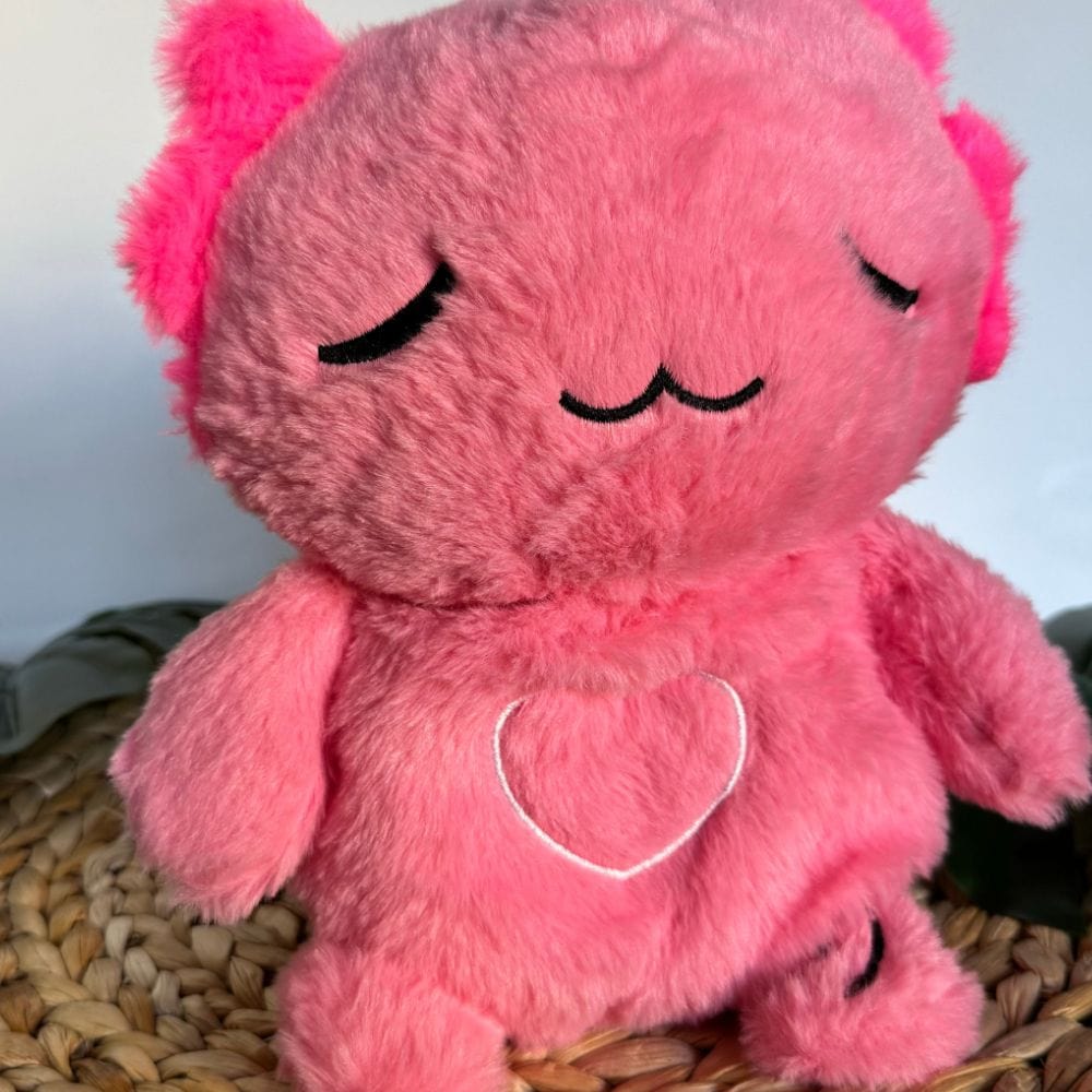 La Peluche Peluche veilleuse Axolotl respirante avec berceuses