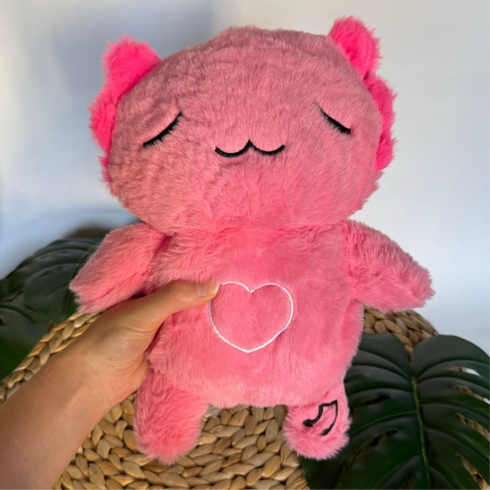 La Peluche Peluche veilleuse Axolotl respirante avec berceuses