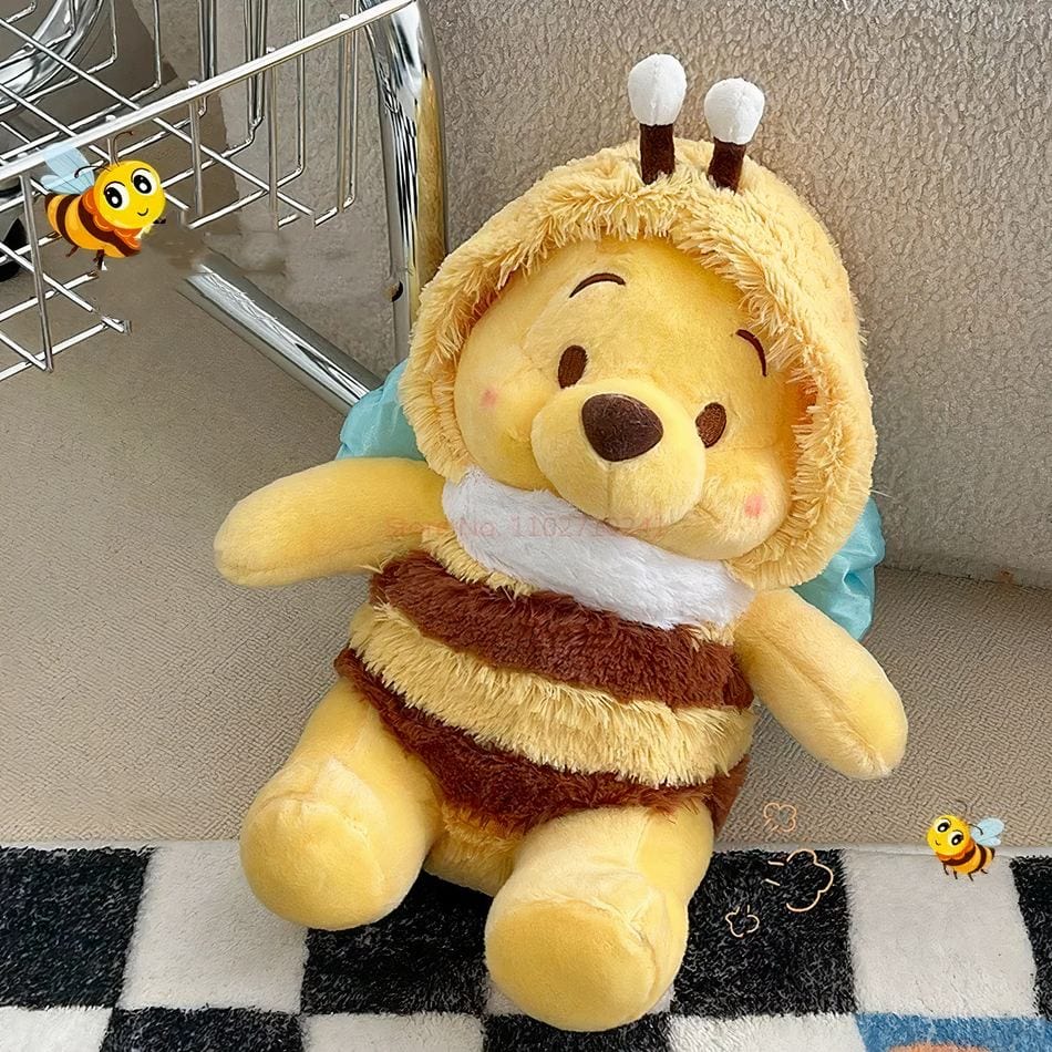 La Peluche Peluche Winnie l’ourson en abeille
