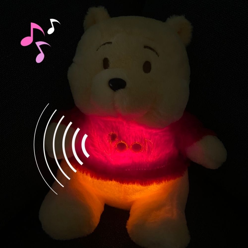 La Peluche Peluche Winnie l’ourson respirante avec berceuses