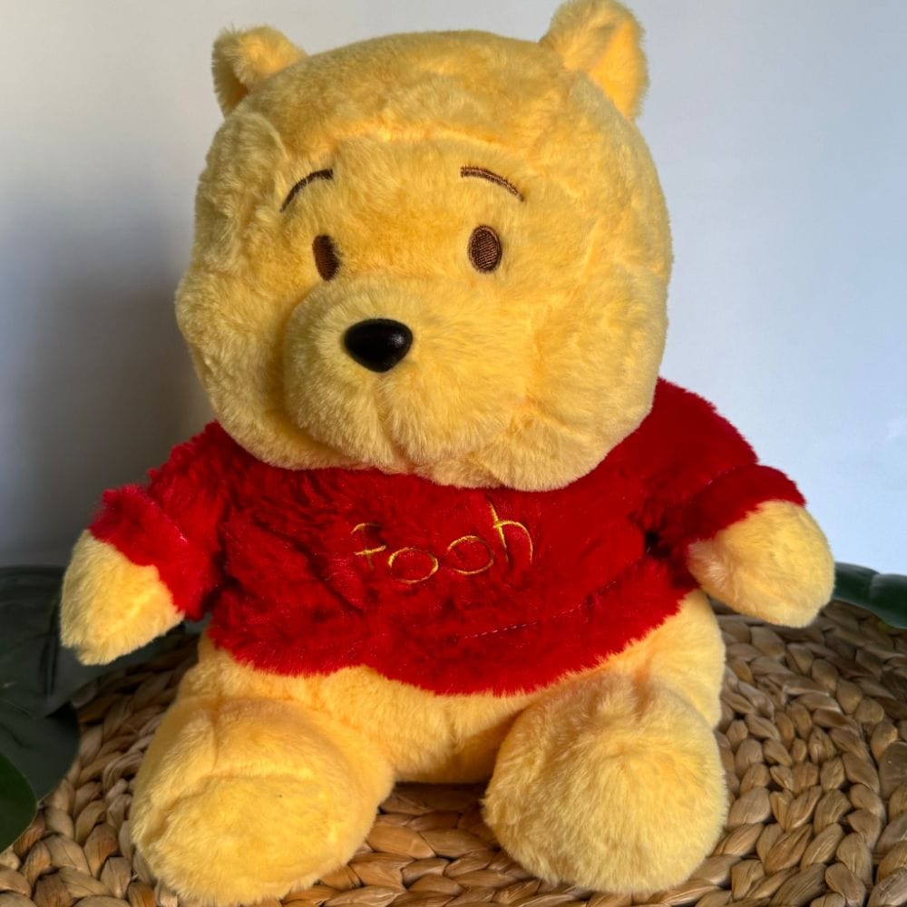 La Peluche Peluche Winnie l’ourson respirante avec berceuses