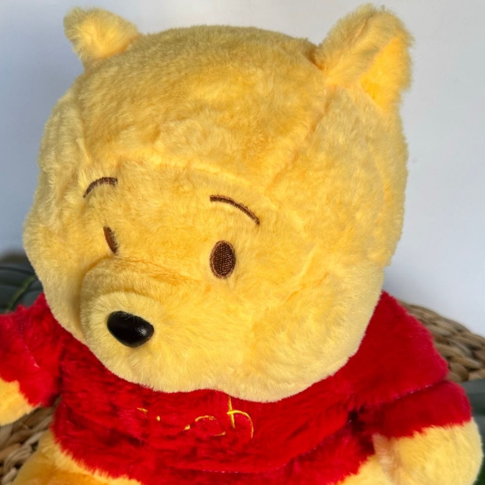 La Peluche Peluche Winnie l’ourson respirante avec berceuses