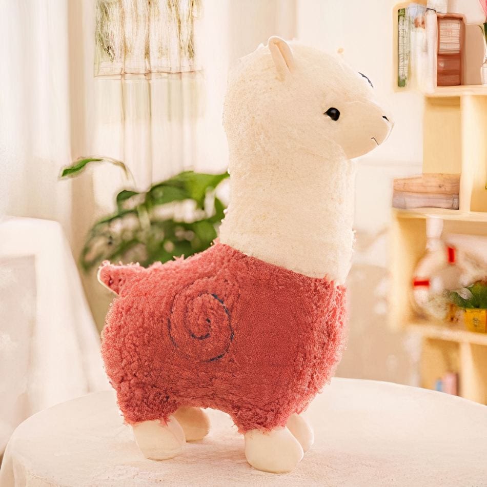 La Peluche Rose Peluche alpaga à robe colorée