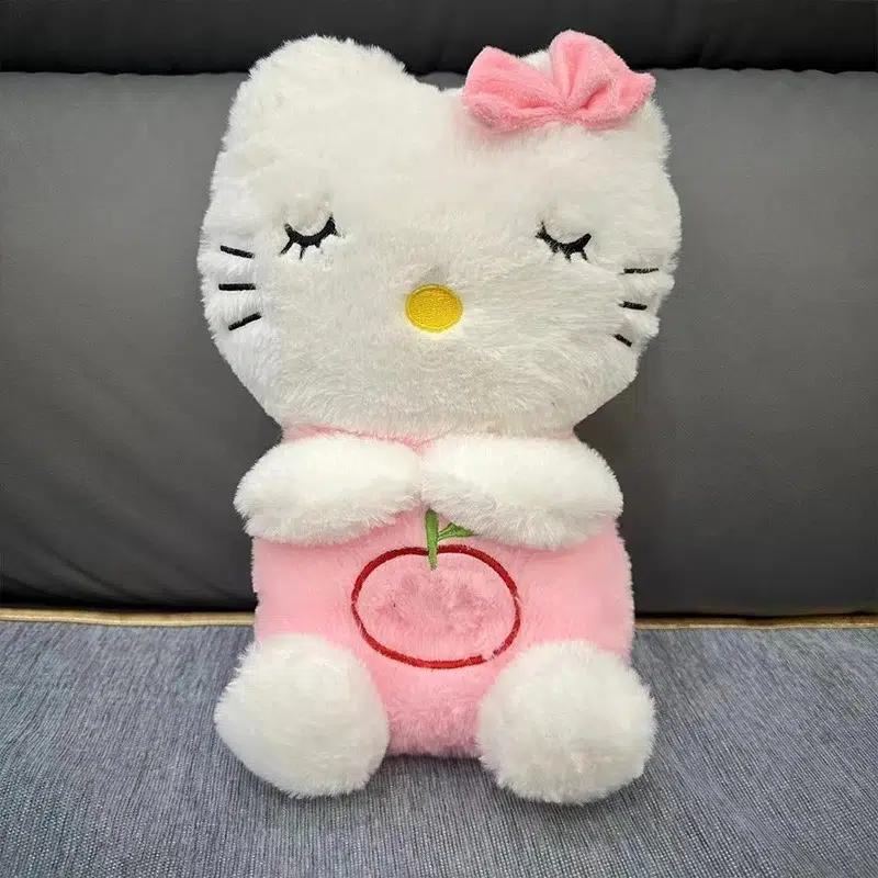 La Peluche Rose Peluche Hello Kitty respirante avec berceuse