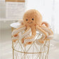 La Peluche 18cm / Orange Peluche pieuvre souriante