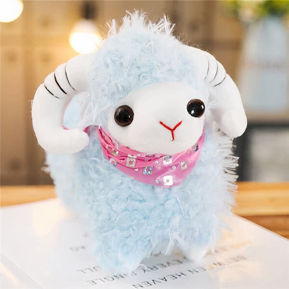 La Peluche Bleu Peluche chèvre pour petite fille
