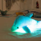 La Peluche Bleu Peluche dauphin lumineux