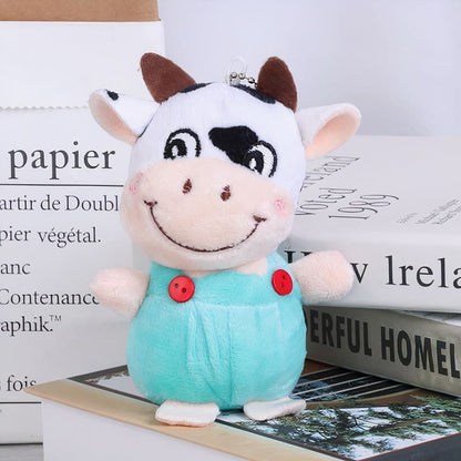 La Peluche Bleu Peluche vache porte-clés