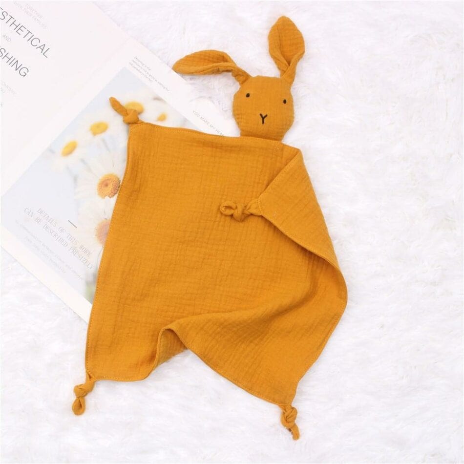 La Peluche Orange Doudou lapin  pour bébé